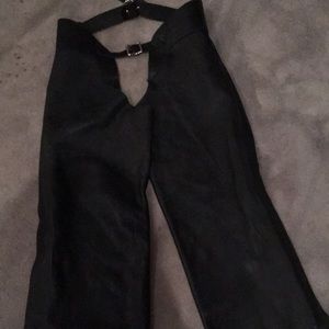 Soft black leather chaps.  Covered zipper on rack leg.  Size 10-12